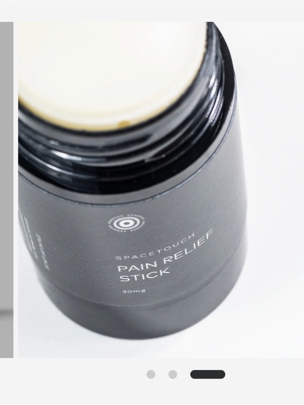SpaceTouch Pain Relief Stick in Silver Packaging